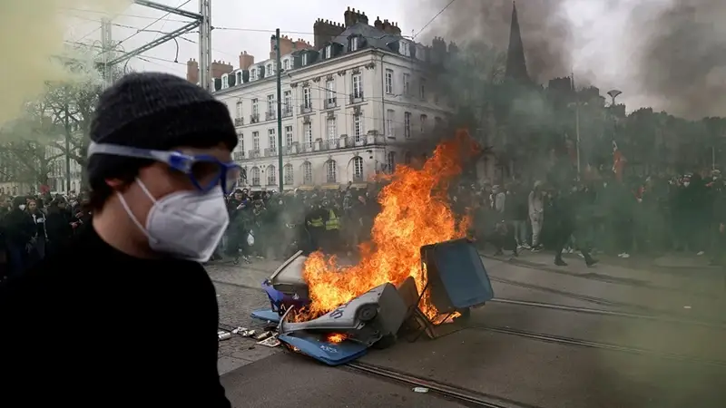 National strike over increased pension age affects French airports, schools, and oil refineries.