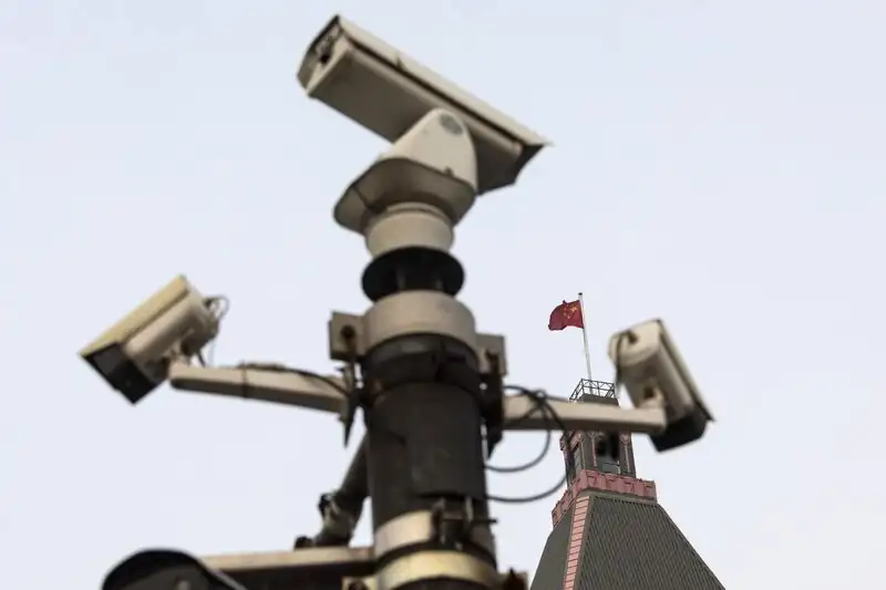 China expands definition of espionage in new law.