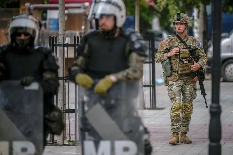 Kosovo and Serbia Warned by EU to Cease Violence, Threatened with Consequences.