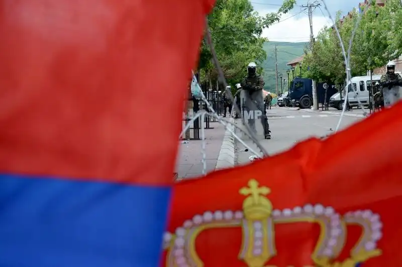 Serbia warns of military action in Kosovo, urges NATO to safeguard Serbian ethnic group.