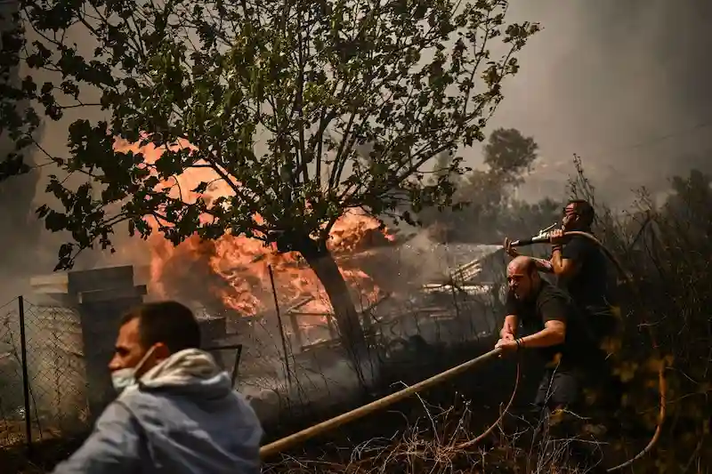 Wildfires Devastate Athens, Destroying Homes and Forest Land