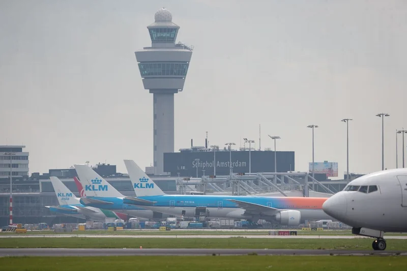 KLM strongly criticizes Dutch Parliament's proposal to impose tax on transit travelers.
