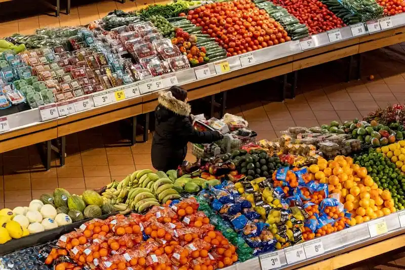 Canadian grocery chains commit to lowering food prices with government support.