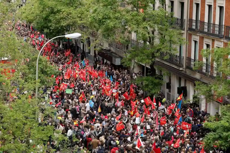 Spanish socialists rally in the streets to support PM Sanchez.