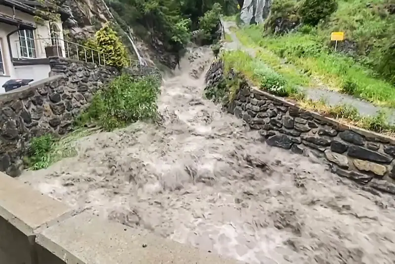Swiss Authorities on High Alert as Torrential Downpours Unleash Floods and Landslides