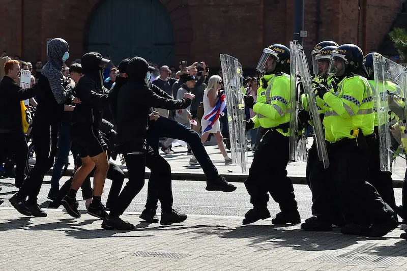 Violent Protests Engulf UK Cities, Police Injured as Clashes Escalate